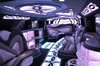 Black Hummer Limo Perth interior, three bars, rgb lights in ceiling, it's showtime! 16 Seater by Showtime Limousines Perth LImo Hire