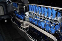 bar and champagne glasses in limo bar