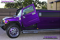 Purple Hummer Stretch Limousine with Lamborghini Doors (Vertical Doors)