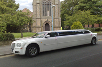 church and wedding limousine